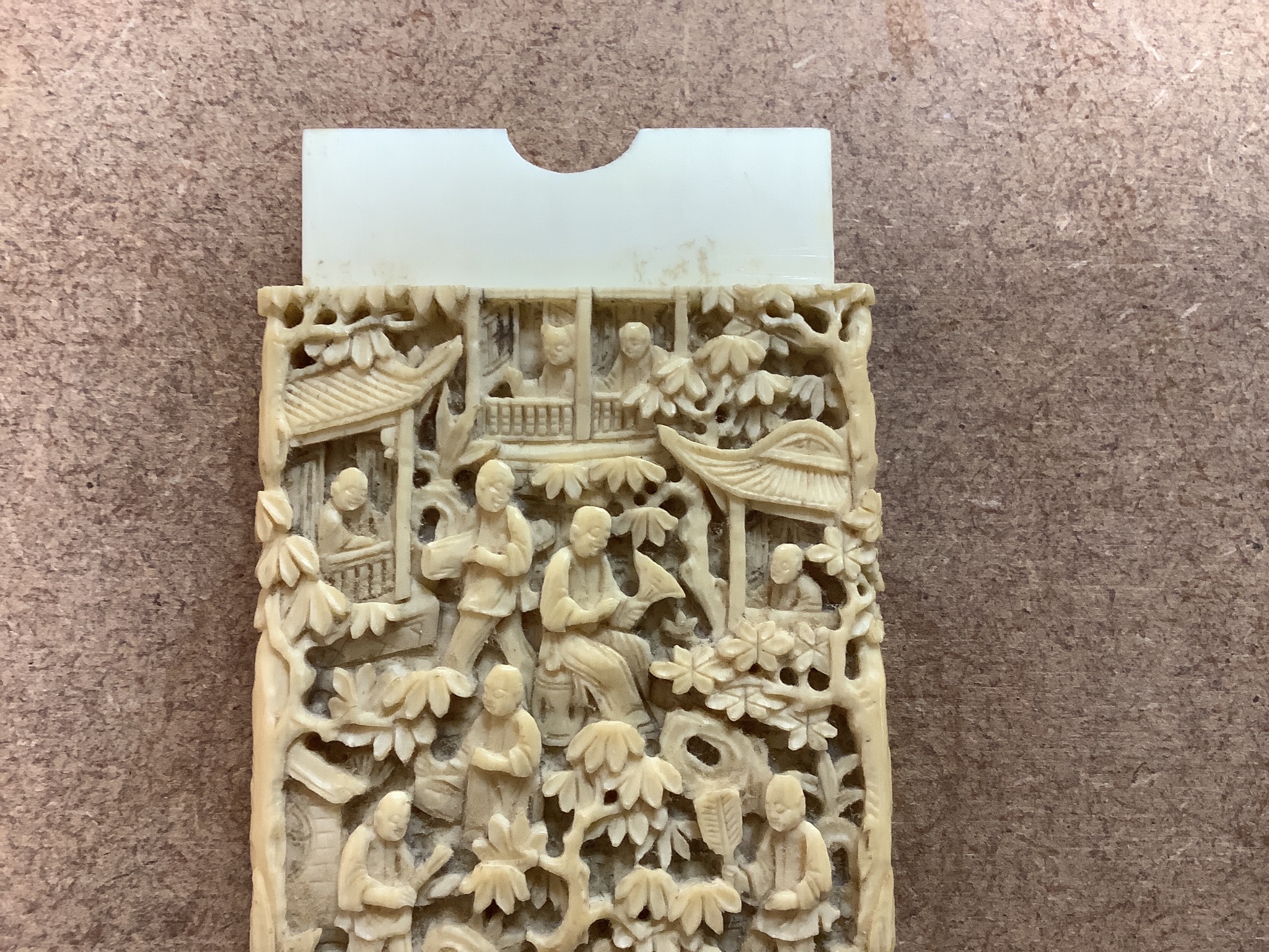 A Chinese Cantonese carved ivory card case, 9.5cm